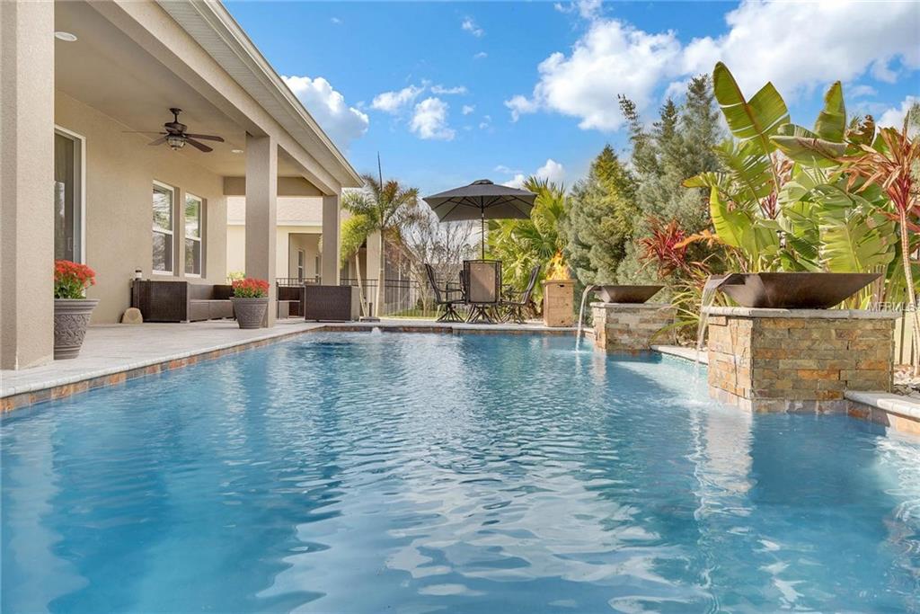 15455 SANDFIELD LOOP, WINTER GARDEN, Florida 34787, 4 Bedrooms Bedrooms, 11 Rooms Rooms,3 BathroomsBathrooms,Residential,For sale,SANDFIELD,O5561586