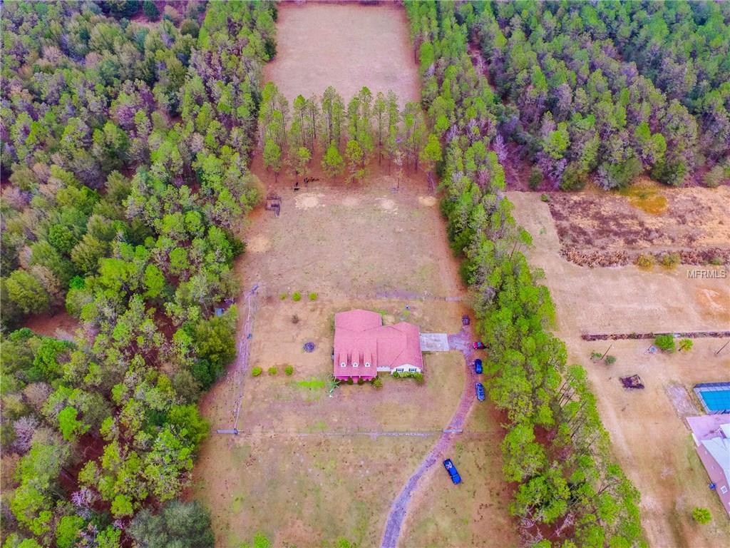 16002 LAKE IOLA ROAD, DADE CITY, Florida 33523, 4 Bedrooms Bedrooms, 7 Rooms Rooms,3 BathroomsBathrooms,Residential,For sale,LAKE IOLA,U7846415