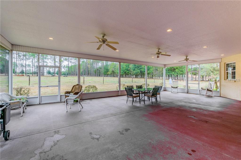 16002 LAKE IOLA ROAD, DADE CITY, Florida 33523, 4 Bedrooms Bedrooms, 7 Rooms Rooms,3 BathroomsBathrooms,Residential,For sale,LAKE IOLA,U7846415