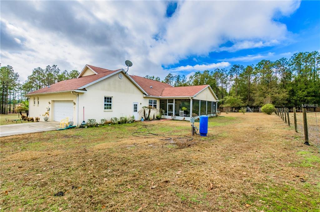 16002 LAKE IOLA ROAD, DADE CITY, Florida 33523, 4 Bedrooms Bedrooms, 7 Rooms Rooms,3 BathroomsBathrooms,Residential,For sale,LAKE IOLA,U7846415