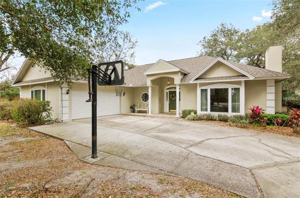 7133 WOODED VILLAGE LANE, ORLANDO, Florida 32835, 5 Bedrooms Bedrooms, 8 Rooms Rooms,3 BathroomsBathrooms,Residential,For sale,WOODED VILLAGE,O5557936