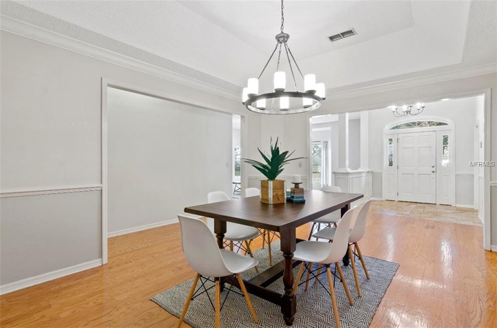 7133 WOODED VILLAGE LANE, ORLANDO, Florida 32835, 5 Bedrooms Bedrooms, 8 Rooms Rooms,3 BathroomsBathrooms,Residential,For sale,WOODED VILLAGE,O5557936