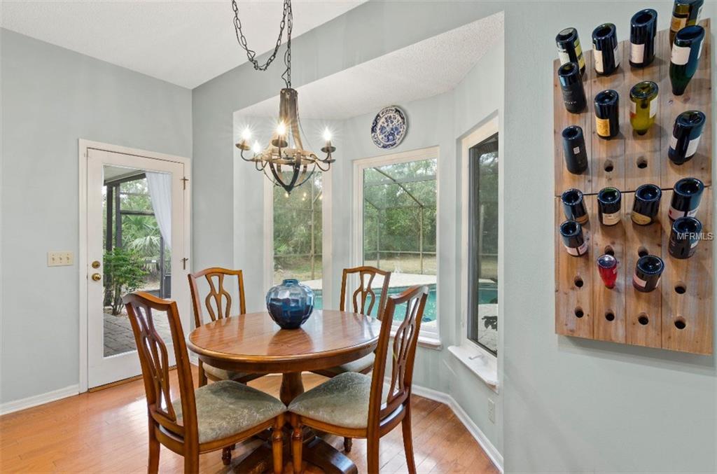 7133 WOODED VILLAGE LANE, ORLANDO, Florida 32835, 5 Bedrooms Bedrooms, 8 Rooms Rooms,3 BathroomsBathrooms,Residential,For sale,WOODED VILLAGE,O5557936