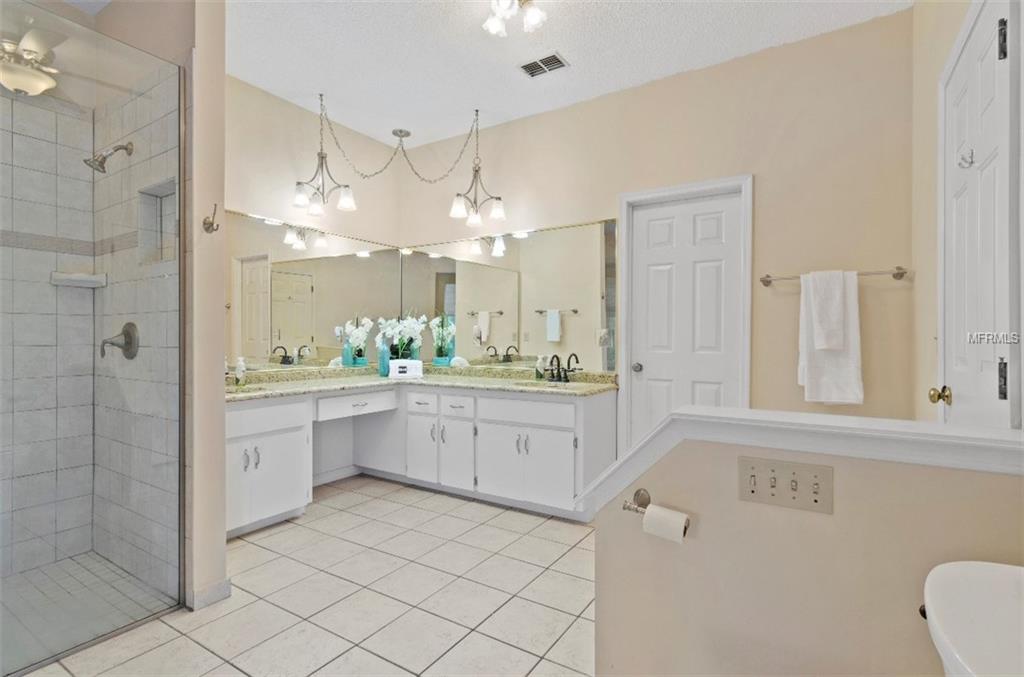 7133 WOODED VILLAGE LANE, ORLANDO, Florida 32835, 5 Bedrooms Bedrooms, 8 Rooms Rooms,3 BathroomsBathrooms,Residential,For sale,WOODED VILLAGE,O5557936