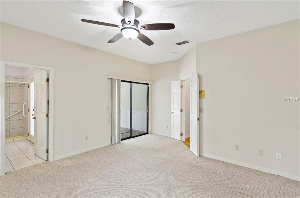 7133 WOODED VILLAGE LANE, ORLANDO, Florida 32835, 5 Bedrooms Bedrooms, 8 Rooms Rooms,3 BathroomsBathrooms,Residential,For sale,WOODED VILLAGE,O5557936