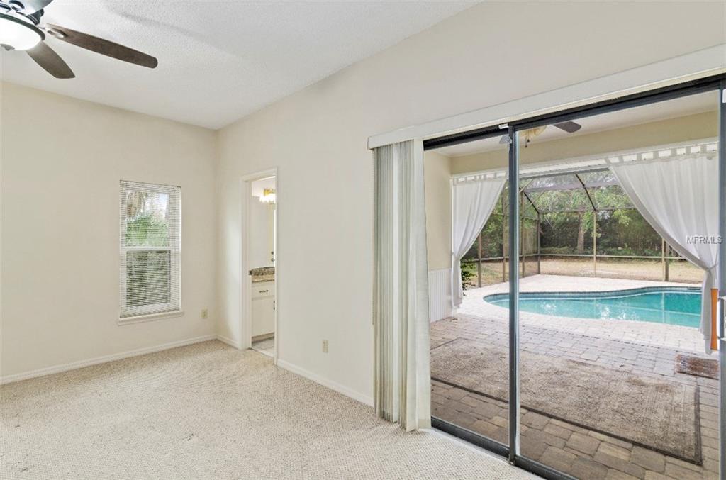 7133 WOODED VILLAGE LANE, ORLANDO, Florida 32835, 5 Bedrooms Bedrooms, 8 Rooms Rooms,3 BathroomsBathrooms,Residential,For sale,WOODED VILLAGE,O5557936