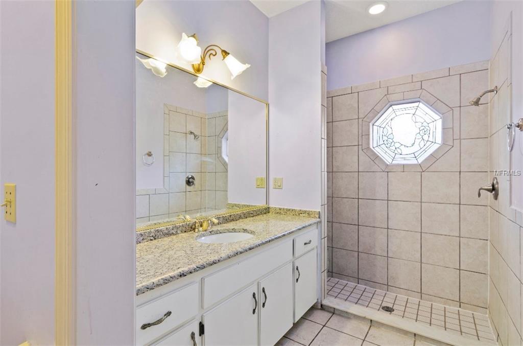 7133 WOODED VILLAGE LANE, ORLANDO, Florida 32835, 5 Bedrooms Bedrooms, 8 Rooms Rooms,3 BathroomsBathrooms,Residential,For sale,WOODED VILLAGE,O5557936