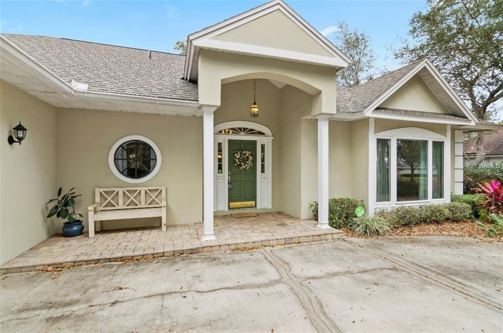 7133 WOODED VILLAGE LANE, ORLANDO, Florida 32835, 5 Bedrooms Bedrooms, 8 Rooms Rooms,3 BathroomsBathrooms,Residential,For sale,WOODED VILLAGE,O5557936