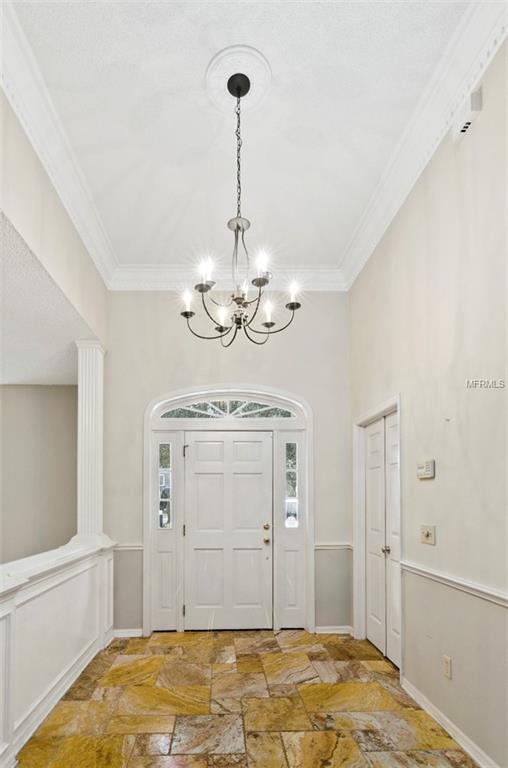 7133 WOODED VILLAGE LANE, ORLANDO, Florida 32835, 5 Bedrooms Bedrooms, 8 Rooms Rooms,3 BathroomsBathrooms,Residential,For sale,WOODED VILLAGE,O5557936