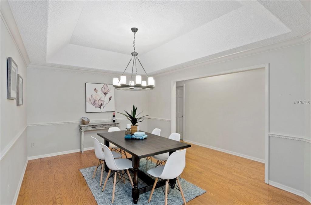 7133 WOODED VILLAGE LANE, ORLANDO, Florida 32835, 5 Bedrooms Bedrooms, 8 Rooms Rooms,3 BathroomsBathrooms,Residential,For sale,WOODED VILLAGE,O5557936