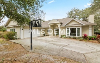 7133 WOODED VILLAGE LANE, ORLANDO, Florida 32835, 5 Bedrooms Bedrooms, 8 Rooms Rooms,3 BathroomsBathrooms,Residential,For sale,WOODED VILLAGE,O5557936