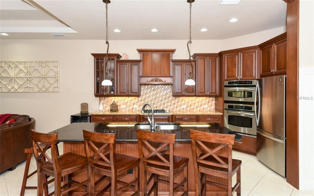 6910 DOMINION LANE, LAKEWOOD RANCH, Florida 34202, 4 Bedrooms Bedrooms, 10 Rooms Rooms,3 BathroomsBathrooms,Residential,For sale,DOMINION,A4206565