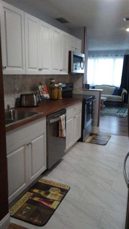 2009 STANLEY STREET, ORLANDO, Florida 32803, 3 Bedrooms Bedrooms, 6 Rooms Rooms,2 BathroomsBathrooms,Residential,For sale,STANLEY,O5551743