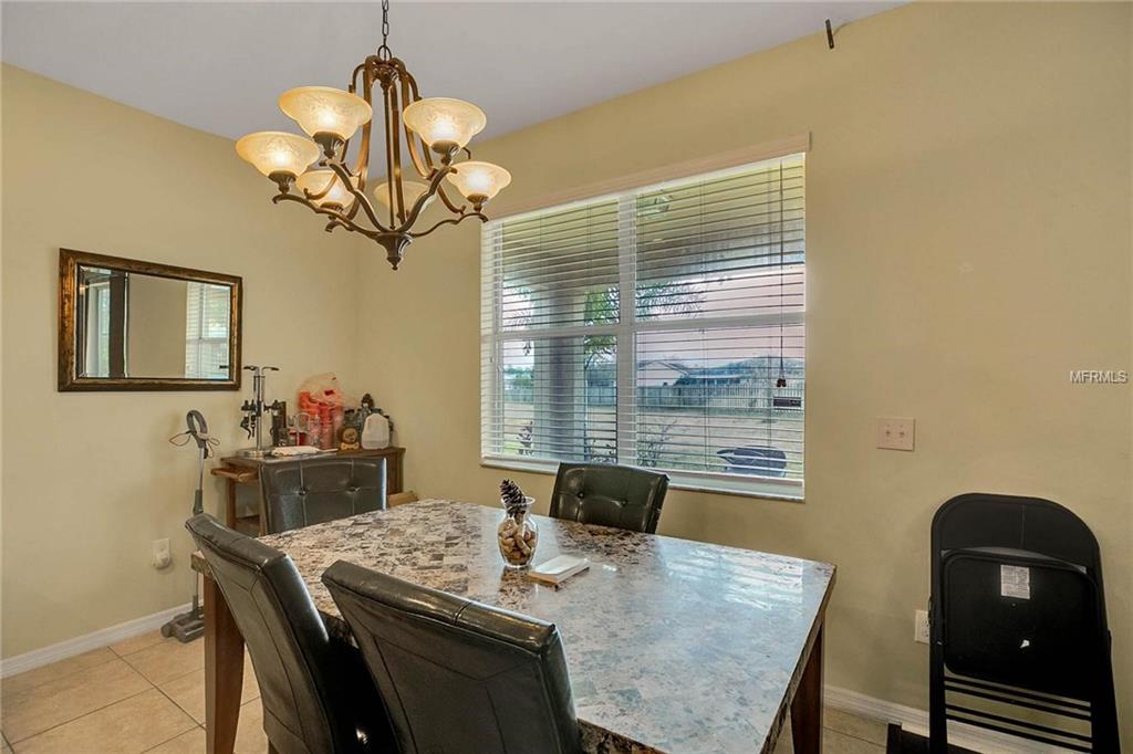 3660 MADBURY CIRCLE, LAKELAND, Florida 33810, 4 Bedrooms Bedrooms, 7 Rooms Rooms,3 BathroomsBathrooms,Residential,For sale,MADBURY,O5553586