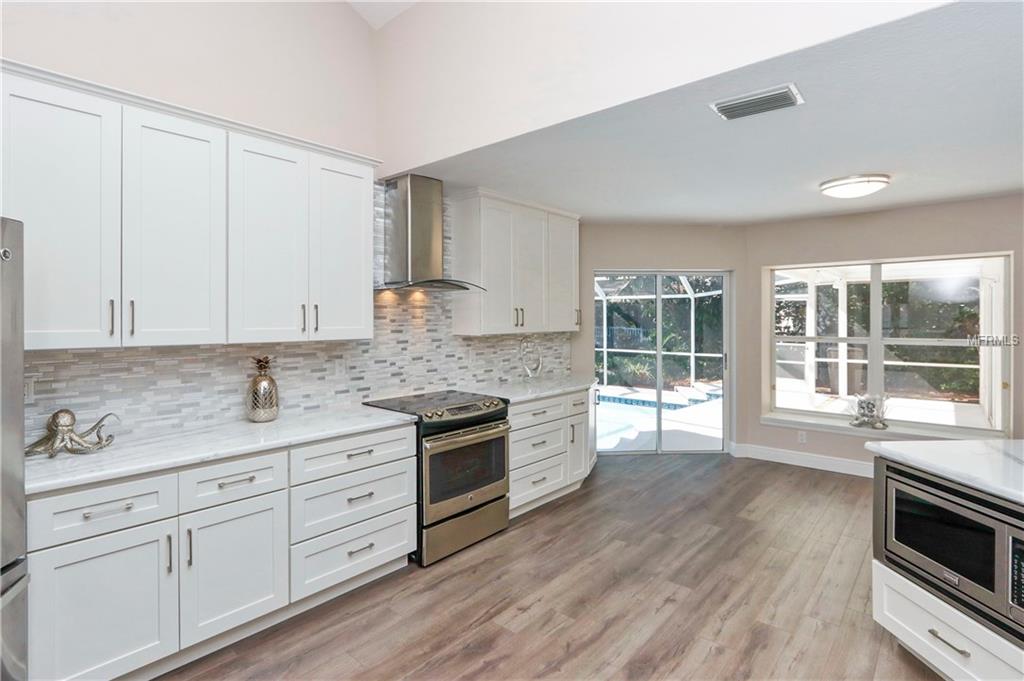 738 WEATHERSFIELD DRIVE, DUNEDIN, Florida 34698, 4 Bedrooms Bedrooms, 8 Rooms Rooms,3 BathroomsBathrooms,Residential,For sale,WEATHERSFIELD,U7837285