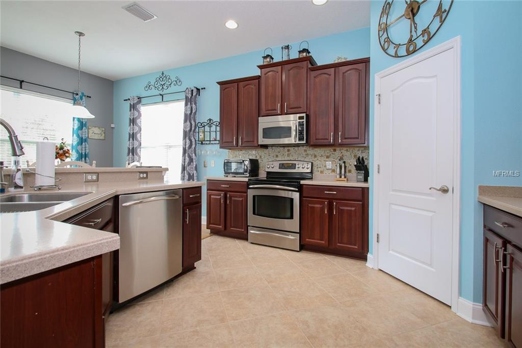 7976 CAMDEN WOODS DRIVE, TAMPA, Florida 33619, 3 Bedrooms Bedrooms, 4 Rooms Rooms,2 BathroomsBathrooms,Residential,For sale,CAMDEN WOODS,T2927780