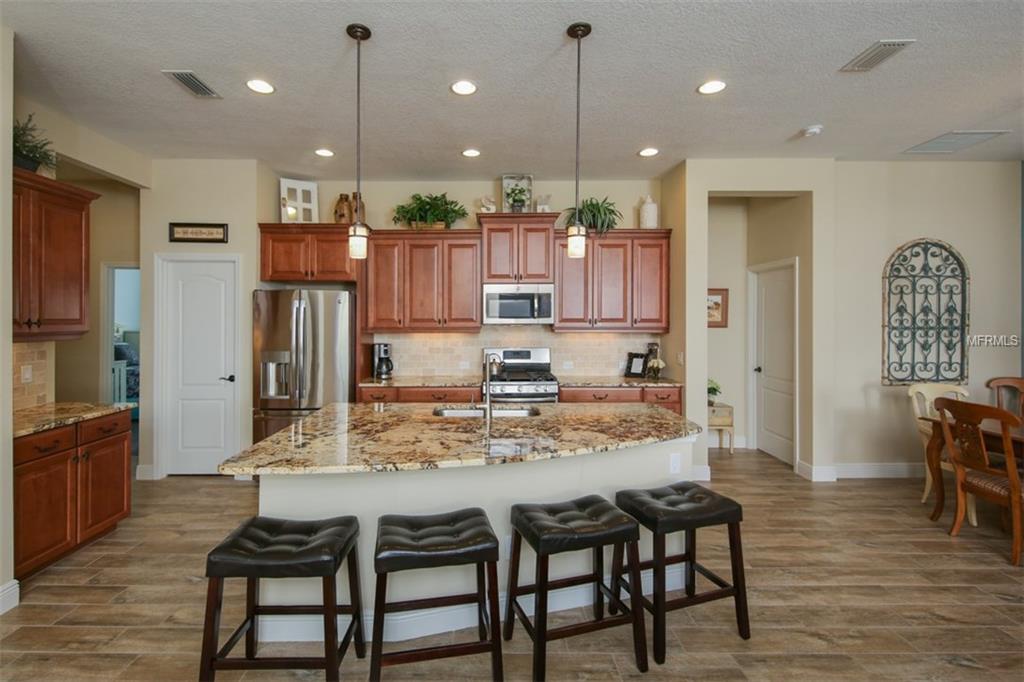 1938 CROOKED LAKE CIRCLE, BRADENTON, Florida 34211, 3 Bedrooms Bedrooms, 9 Rooms Rooms,2 BathroomsBathrooms,Residential,For sale,CROOKED LAKE,A4208524