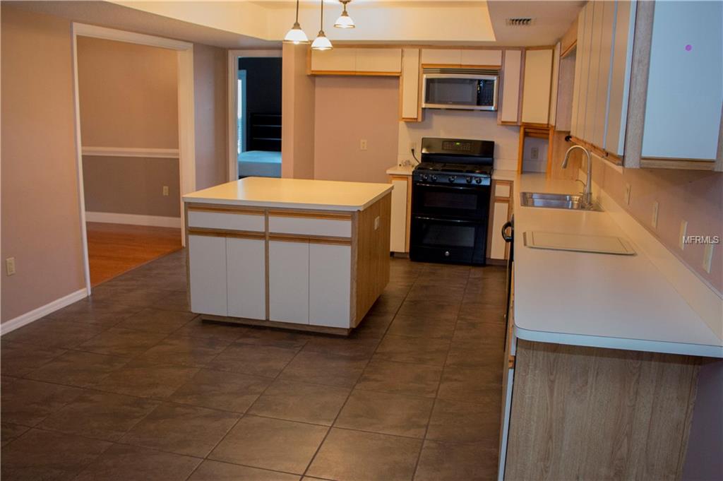 1010 S LAKE MARIAM DRIVE, WINTER HAVEN, Florida 33884, 4 Bedrooms Bedrooms, 8 Rooms Rooms,2 BathroomsBathrooms,Residential,For sale,LAKE MARIAM,P4718174