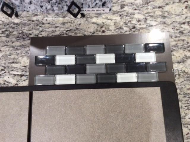 1708 BELLA LAGO DRIVE, CLERMONT, Florida 34711, 3 Bedrooms Bedrooms, 5 Rooms Rooms,3 BathroomsBathrooms,Residential,For sale,BELLA LAGO,G4850602