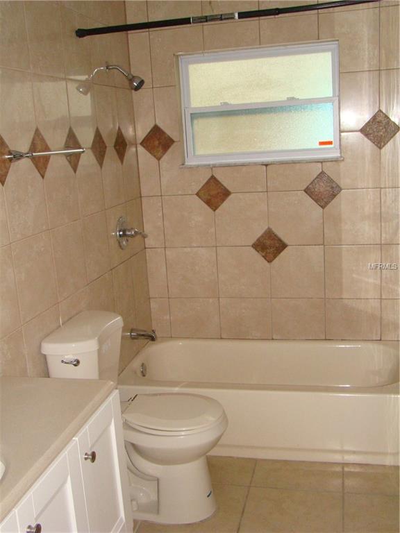 1005 KEATS AVENUE, ORLANDO, Florida 32809, 4 Bedrooms Bedrooms, 9 Rooms Rooms,2 BathroomsBathrooms,Residential,For sale,KEATS,O5561408