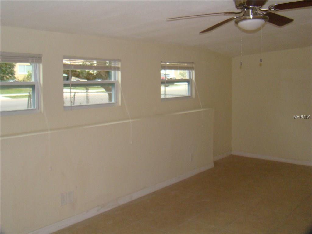 1005 KEATS AVENUE, ORLANDO, Florida 32809, 4 Bedrooms Bedrooms, 9 Rooms Rooms,2 BathroomsBathrooms,Residential,For sale,KEATS,O5561408