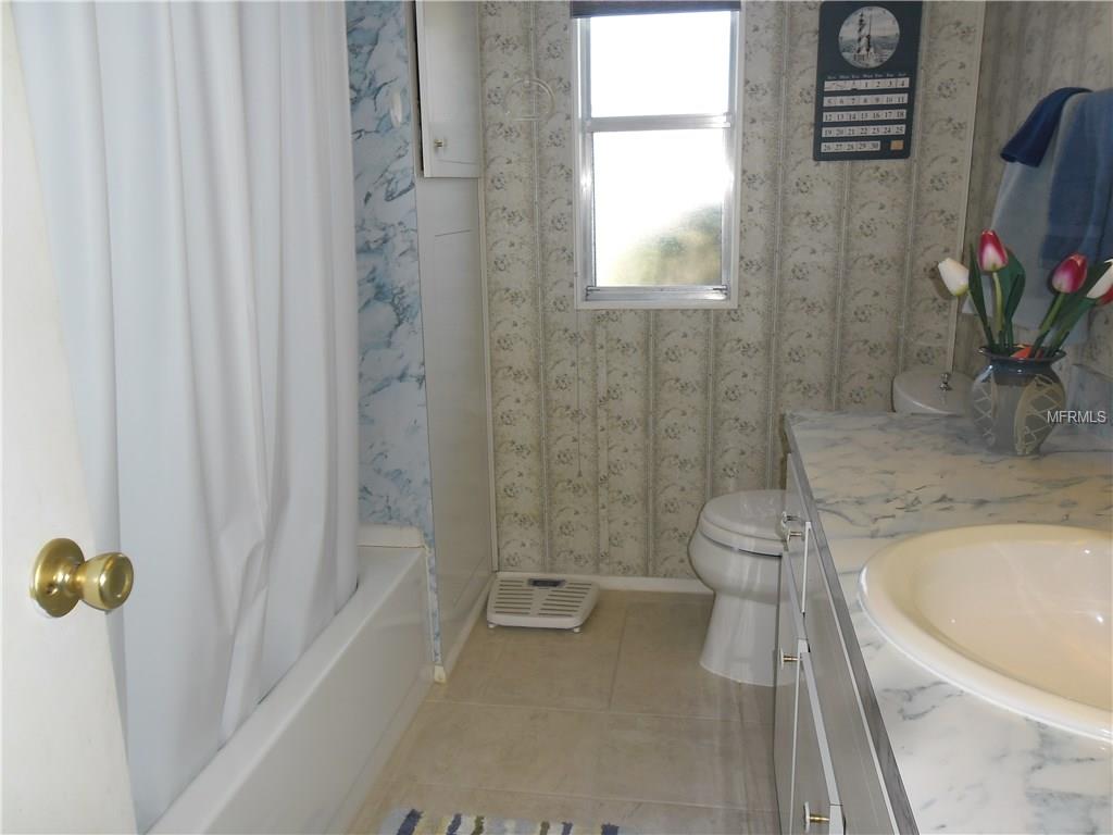 77 TANGLEWOOD DRIVE, PALM HARBOR, Florida 34684, 2 Bedrooms Bedrooms, 6 Rooms Rooms,2 BathroomsBathrooms,Residential,For sale,TANGLEWOOD,U7839070