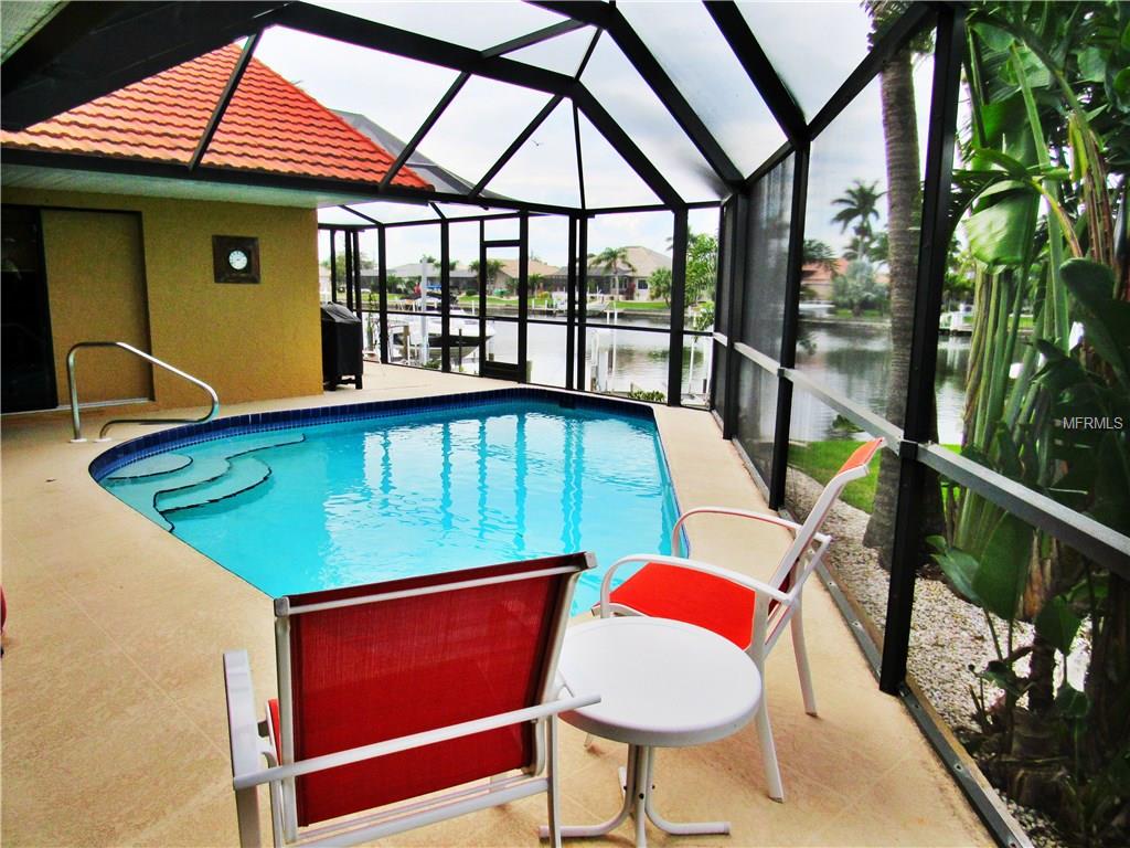 3925 MADRID COURT, PUNTA GORDA, Florida 33950, 3 Bedrooms Bedrooms, 9 Rooms Rooms,2 BathroomsBathrooms,Residential,For sale,MADRID,C7249137