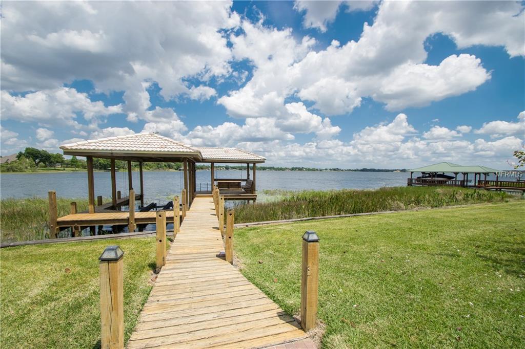 132 WYNDHAM DRIVE, WINTER HAVEN, Florida 33884, 5 Bedrooms Bedrooms, 13 Rooms Rooms,5 BathroomsBathrooms,Residential,For sale,WYNDHAM,P4716841