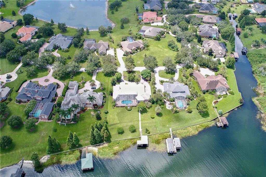 132 WYNDHAM DRIVE, WINTER HAVEN, Florida 33884, 5 Bedrooms Bedrooms, 13 Rooms Rooms,5 BathroomsBathrooms,Residential,For sale,WYNDHAM,P4716841