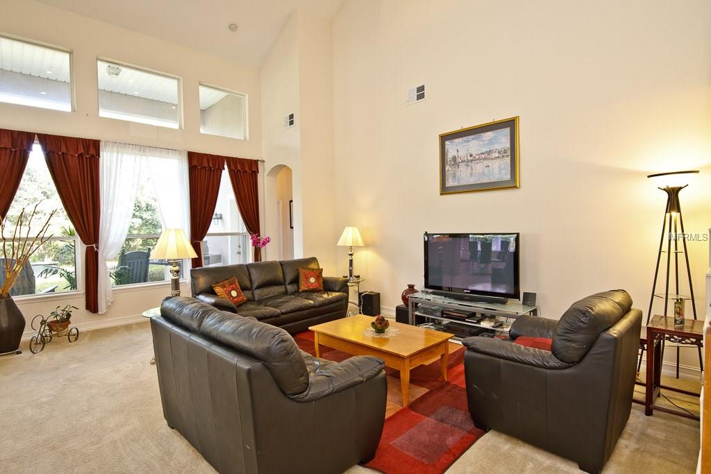 125 IVYDALE MANOR DRIVE, DELAND, Florida 32724, 4 Bedrooms Bedrooms, 8 Rooms Rooms,3 BathroomsBathrooms,Residential,For sale,IVYDALE MANOR,V4722340