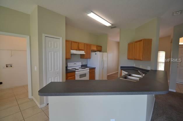 3607 WEATHERFIELD DRIVE, KISSIMMEE, Florida 34746, 3 Bedrooms Bedrooms, 3 Rooms Rooms,2 BathroomsBathrooms,Residential,For sale,WEATHERFIELD,T2908774