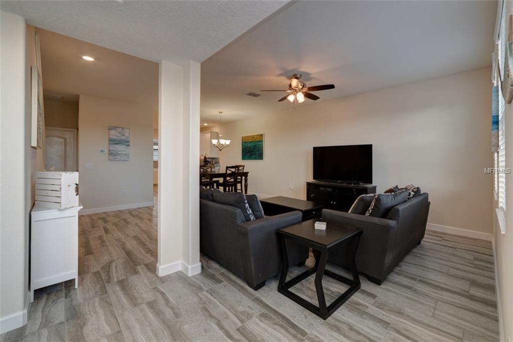 1341 SHINNECOCK HILLS DR, CHAMPIONS GATE, Florida 33896, 4 Bedrooms Bedrooms, 8 Rooms Rooms,4 BathroomsBathrooms,Residential,For sale,SHINNECOCK HILLS DR,S4855782