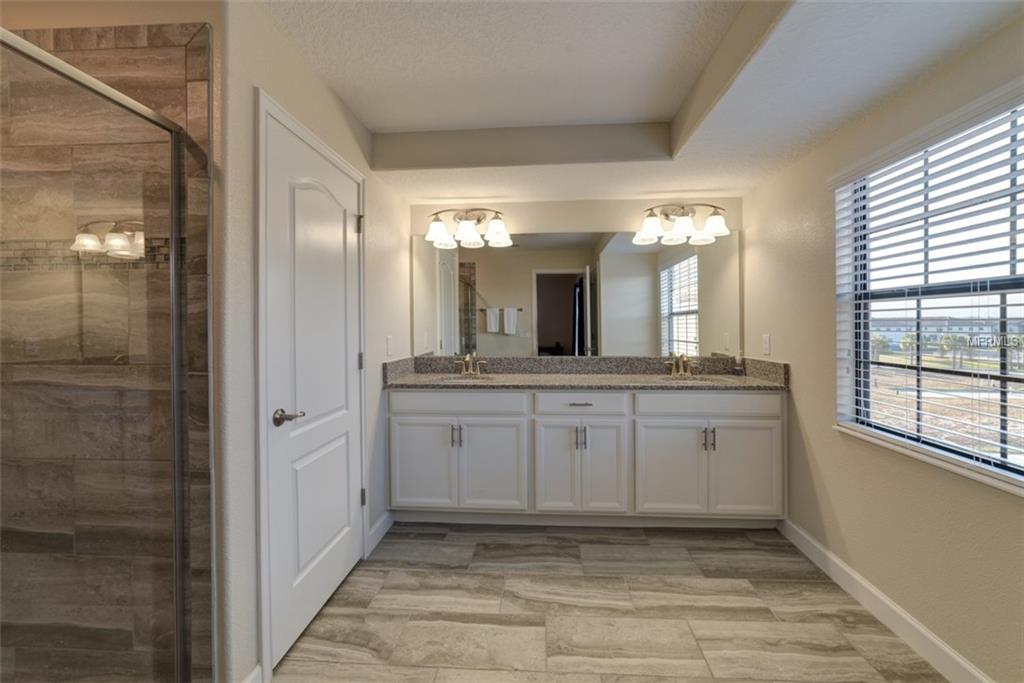 1341 SHINNECOCK HILLS DR, CHAMPIONS GATE, Florida 33896, 4 Bedrooms Bedrooms, 8 Rooms Rooms,4 BathroomsBathrooms,Residential,For sale,SHINNECOCK HILLS DR,S4855782