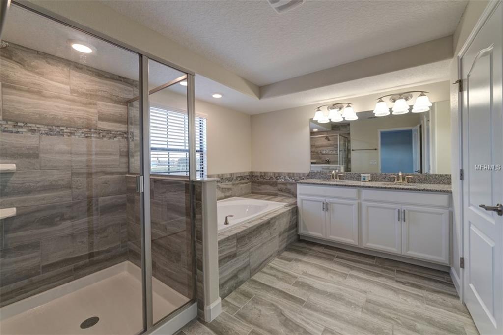 1341 SHINNECOCK HILLS DR, CHAMPIONS GATE, Florida 33896, 4 Bedrooms Bedrooms, 8 Rooms Rooms,4 BathroomsBathrooms,Residential,For sale,SHINNECOCK HILLS DR,S4855782