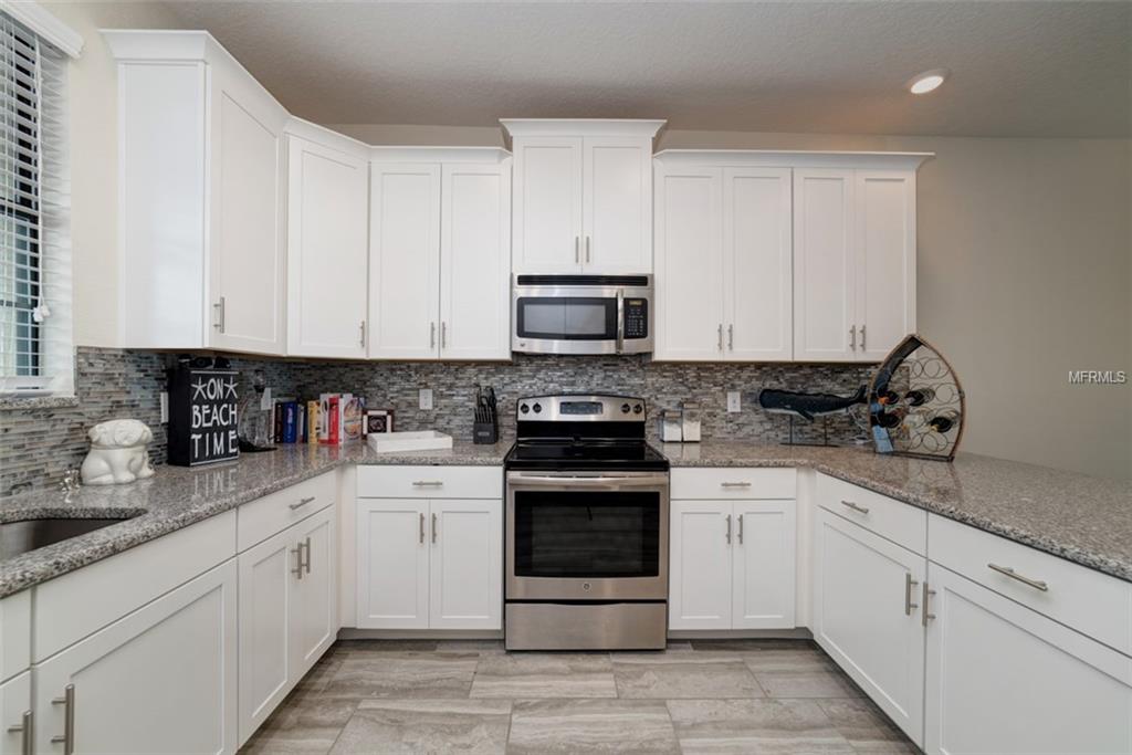 1341 SHINNECOCK HILLS DR, CHAMPIONS GATE, Florida 33896, 4 Bedrooms Bedrooms, 8 Rooms Rooms,4 BathroomsBathrooms,Residential,For sale,SHINNECOCK HILLS DR,S4855782