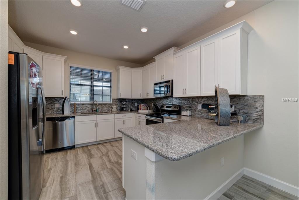 1341 SHINNECOCK HILLS DR, CHAMPIONS GATE, Florida 33896, 4 Bedrooms Bedrooms, 8 Rooms Rooms,4 BathroomsBathrooms,Residential,For sale,SHINNECOCK HILLS DR,S4855782