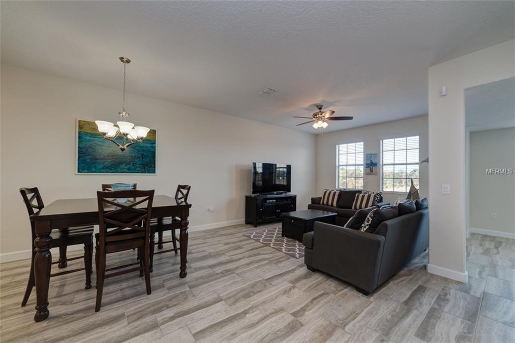 1341 SHINNECOCK HILLS DR, CHAMPIONS GATE, Florida 33896, 4 Bedrooms Bedrooms, 8 Rooms Rooms,4 BathroomsBathrooms,Residential,For sale,SHINNECOCK HILLS DR,S4855782