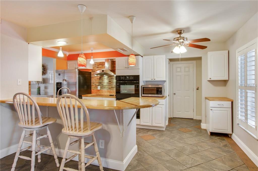 1539 TWIN PALMS LOOP, LUTZ, Florida 33559, 4 Bedrooms Bedrooms, 8 Rooms Rooms,2 BathroomsBathrooms,Residential,For sale,TWIN PALMS,T2928567