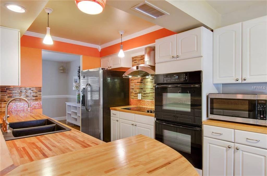 1539 TWIN PALMS LOOP, LUTZ, Florida 33559, 4 Bedrooms Bedrooms, 8 Rooms Rooms,2 BathroomsBathrooms,Residential,For sale,TWIN PALMS,T2928567