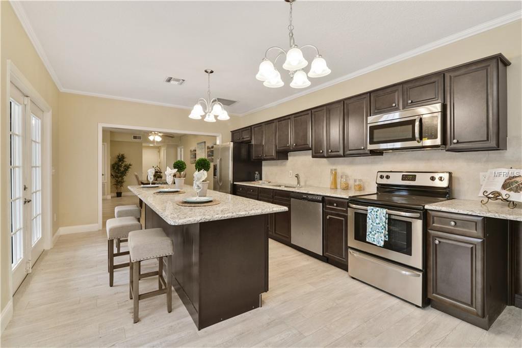 1521 SUGARWOOD CIRCLE, WINTER PARK, Florida 32792, 4 Bedrooms Bedrooms, 7 Rooms Rooms,4 BathroomsBathrooms,Residential,For sale,SUGARWOOD,S4855517