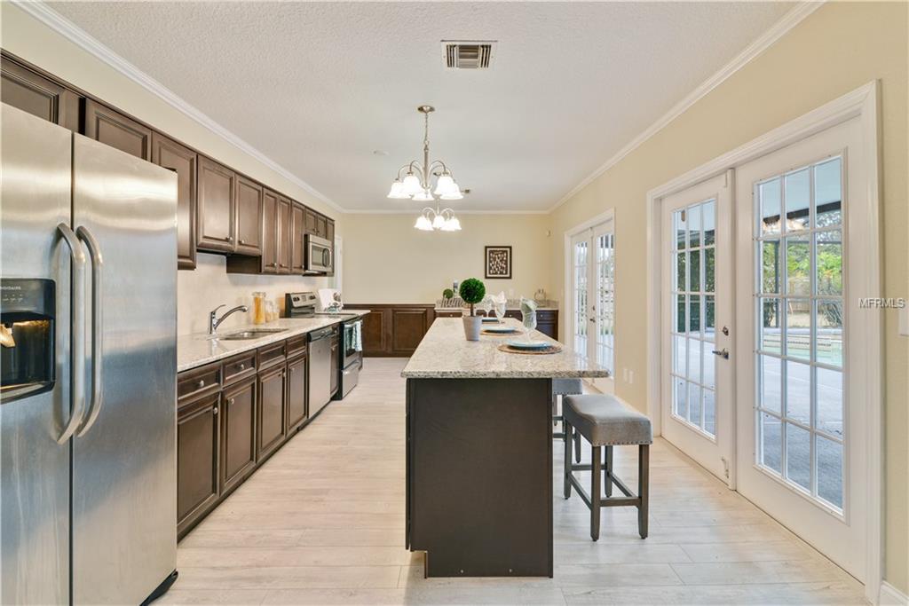 1521 SUGARWOOD CIRCLE, WINTER PARK, Florida 32792, 4 Bedrooms Bedrooms, 7 Rooms Rooms,4 BathroomsBathrooms,Residential,For sale,SUGARWOOD,S4855517