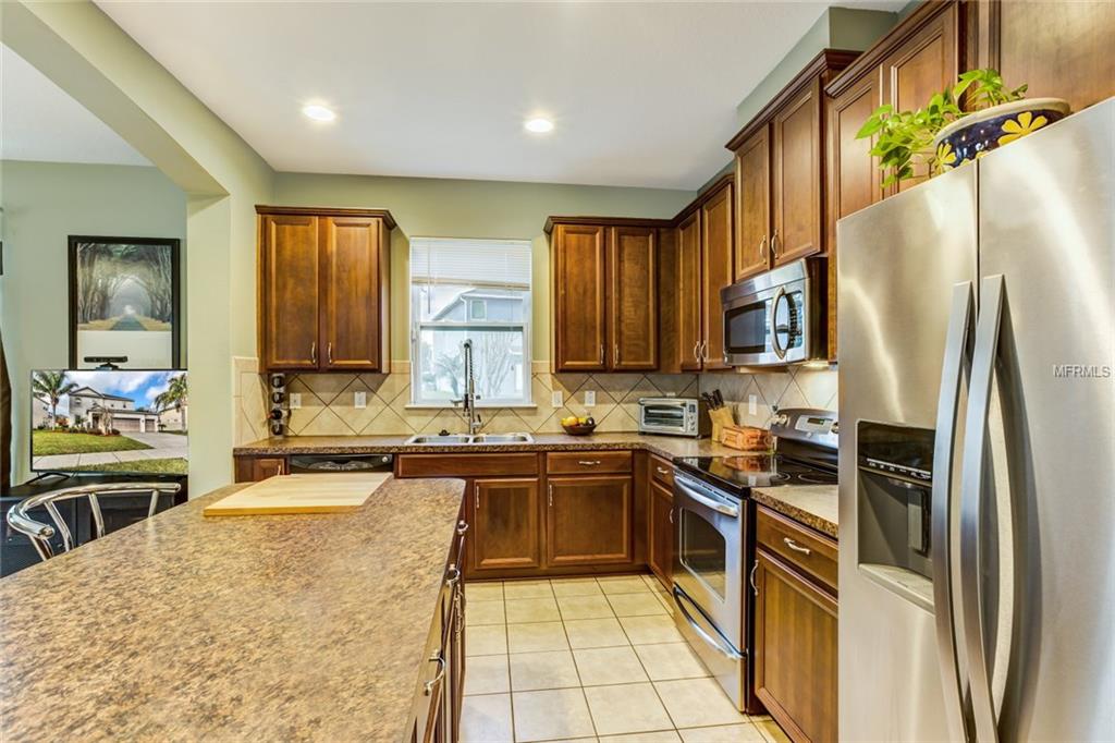 664 WOOSTER DRIVE, OCOEE, Florida 34761, 4 Bedrooms Bedrooms, 6 Rooms Rooms,3 BathroomsBathrooms,Residential,For sale,WOOSTER,O5561166