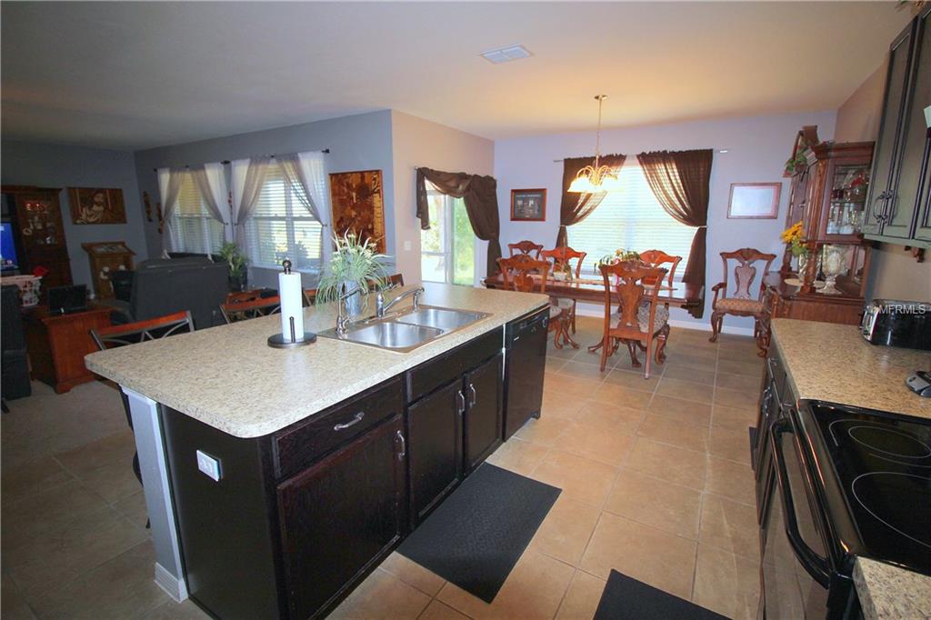 308 ASHTON WOODS LANE, LEESBURG, Florida 34748, 4 Bedrooms Bedrooms, 7 Rooms Rooms,2 BathroomsBathrooms,Residential,For sale,ASHTON WOODS,O5560084