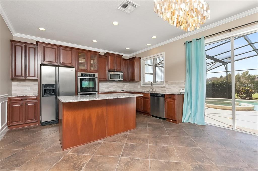 12542 OULTON CIRCLE, ORLANDO, Florida 32832, 4 Bedrooms Bedrooms, 8 Rooms Rooms,2 BathroomsBathrooms,Residential,For sale,OULTON,O5537336