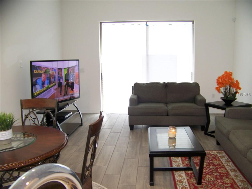 10154 HENBURY STREET, ORLANDO, Florida 32832, 4 Bedrooms Bedrooms, 8 Rooms Rooms,3 BathroomsBathrooms,Residential,For sale,HENBURY,O5560530