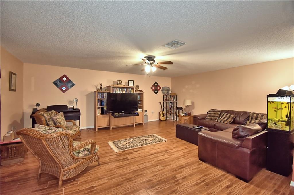 5862 WINDRIDGE DRIVE, WINTER HAVEN, Florida 33881, 4 Bedrooms Bedrooms, 10 Rooms Rooms,3 BathroomsBathrooms,Residential,For sale,WINDRIDGE,P4719004