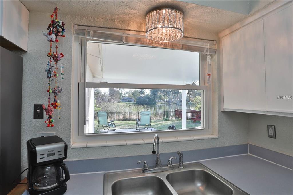 1501 COUNTRY LANE E, CLEARWATER, Florida 33759, 3 Bedrooms Bedrooms, 7 Rooms Rooms,2 BathroomsBathrooms,Residential,For sale,COUNTRY,U7845723