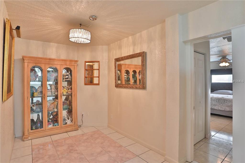 1501 COUNTRY LANE E, CLEARWATER, Florida 33759, 3 Bedrooms Bedrooms, 7 Rooms Rooms,2 BathroomsBathrooms,Residential,For sale,COUNTRY,U7845723