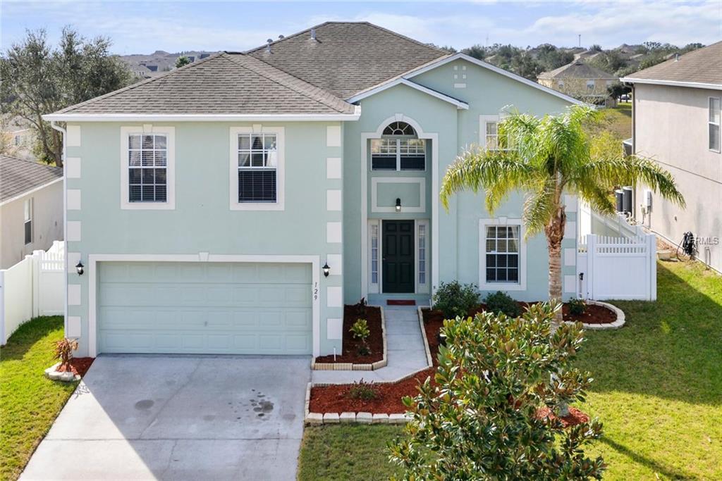 129 MILESTONE DRIVE, HAINES CITY, Florida 33844, 4 Bedrooms Bedrooms, 9 Rooms Rooms,2 BathroomsBathrooms,Residential,For sale,MILESTONE,S4856928