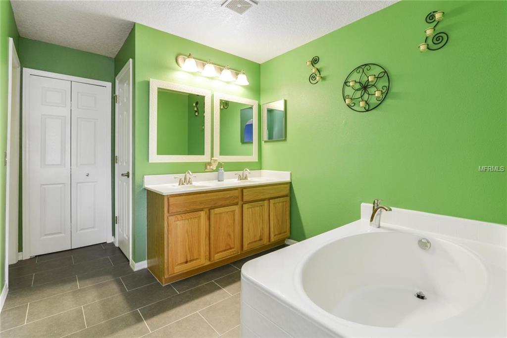 129 MILESTONE DRIVE, HAINES CITY, Florida 33844, 4 Bedrooms Bedrooms, 9 Rooms Rooms,2 BathroomsBathrooms,Residential,For sale,MILESTONE,S4856928